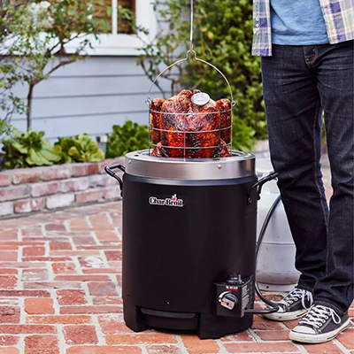 CHAR-BROIL<sup>&reg;</sup> Gas Oil-Less Turkey Fryer - Get the fastest, safest, and easiest way to fry. The Big Easy Oil-less Turkey Fryer is powered by TRU-Infrared cooking technology for juicy results inside and a crispy outside every time. With no need for oil, avoid the extra calories and stress of clean-up. Holding up to 16 pounds, cook your turkeys, roasts and chicken with ease. A rotary ignition provides a quick and easy light with the turn of a knob, and a front access grease tray makes cleaning quick.